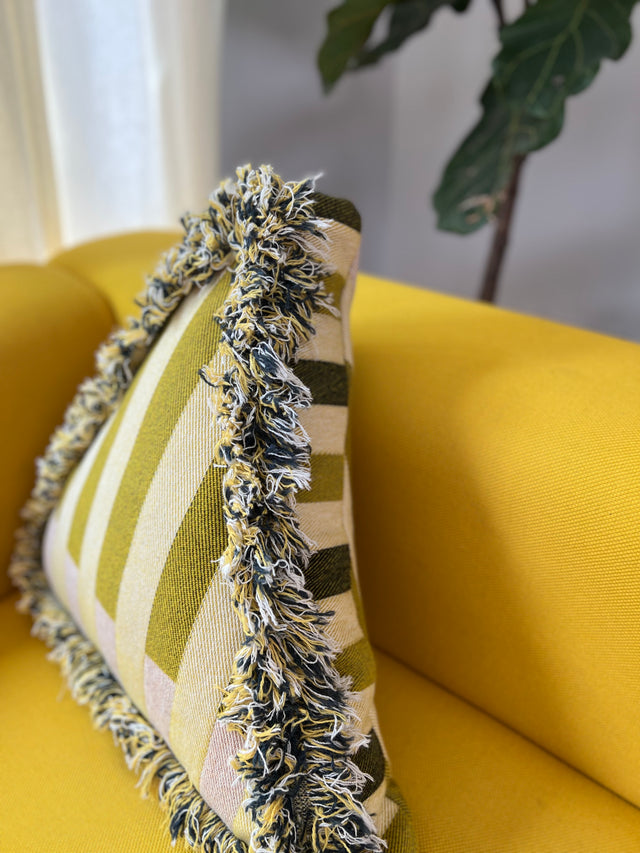 Yellow stripey triangle cushion